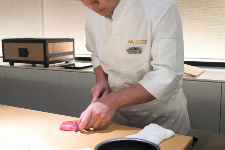 What is Omakase : Experience personalized sushi service and the artistry of eight-seat counters in Singapore’s restaurants.