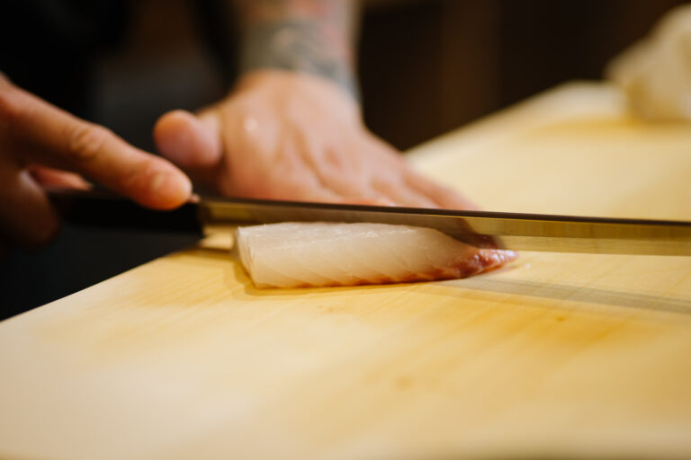 Japan Cuisine Singapore : Chef Masa preparing seasonal dishes for attentive diners in Singapore.