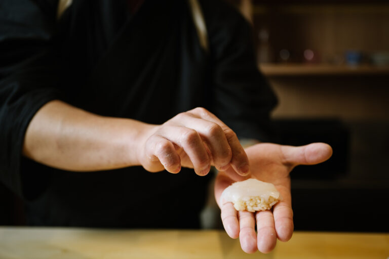 Japan Cuisine Singapore : Close interaction between chef and diners at a Japanese omakase counter.