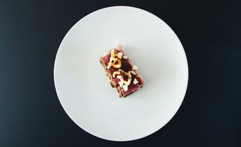 Fine Dining in SG : Elegant table setting, showcasing modern French cuisine with Asian inspiration.