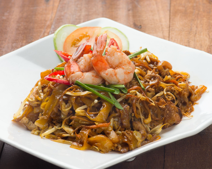 Singapore Best Food : Modern dining innovations featuring Char Kway Teow, reimagined with premium ingredients and refined presentation.