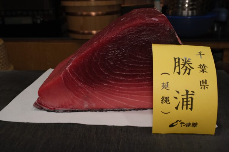 Sashimi Restaurant : Freshly caught tuna fish highlighting the pristine quality and vibrant colours essential for top-grade sushi.