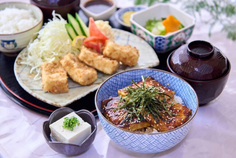 Japanese Food in SG : A beautifully arranged Japanese set meal featuring miso soup, grilled fish, pickles, and rice, reflecting the balance and harmony of traditional cuisine.