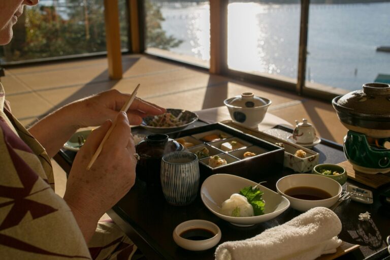 Japanese Food in SG : A traditional Japanese dining experience with tatami mats, low tables, and delicate tableware creating an authentic and serene atmosphere.