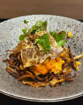 An omakase dish composed like a painting, where colours, form, and detail reflect the chef’s artistic vision.