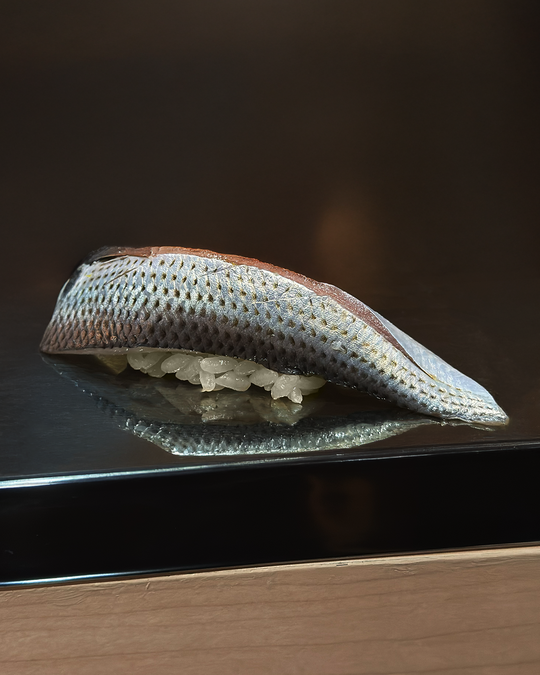 Edomae-style sushi presented with quiet elegance, blending time-honoured methods with a modern sense of beauty and restraint.