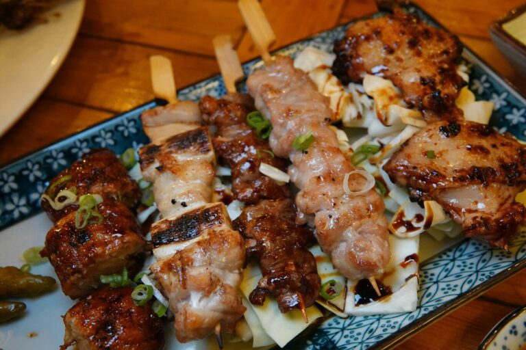 Juicy chicken yakitori skewers glaze and caramelise over the grill, delivering a savoury, smoky depth with every turn