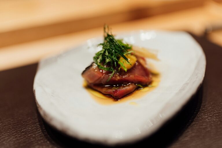 A curated Japanese omakase lunch set laid out on the table, featuring fresh sushi, delicate appetisers, and refined plating.