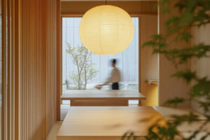 A serene Japanese restaurant featuring an intimate private dining room, designed with warm wood tones and minimalist décor for a refined and exclusive dining experience.