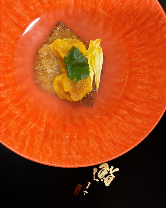 A refined omakase course presented with restraint and harmony, showcasing seasonal ingredients prepared with thoughtful technique.