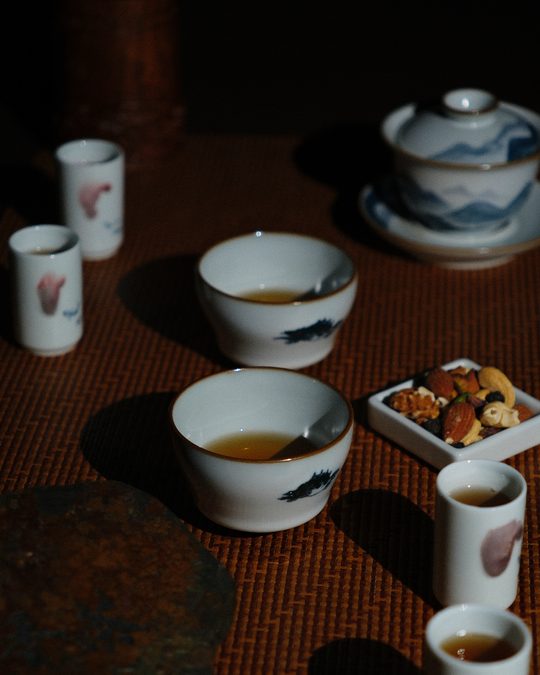 Handcrafted Chinese tea cup displayed in a refined setting, highlighting the harmony between traditional craftsmanship and timeless design, where texture, form, and heritage meet in a single vessel.