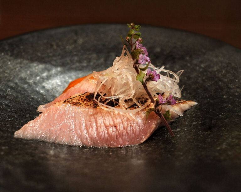 A beautifully plated sushi dish from Sushi Masa, arranged with vibrant colours and delicate garnishes, presenting a refined balance of artistry and flavour.