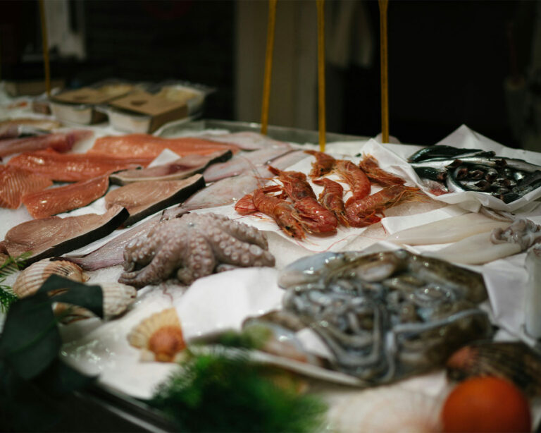 High-quality whole fish displayed for selection, reflecting the chef’s commitment to sourcing fresh, seasonal seafood for authentic Japanese cuisine.