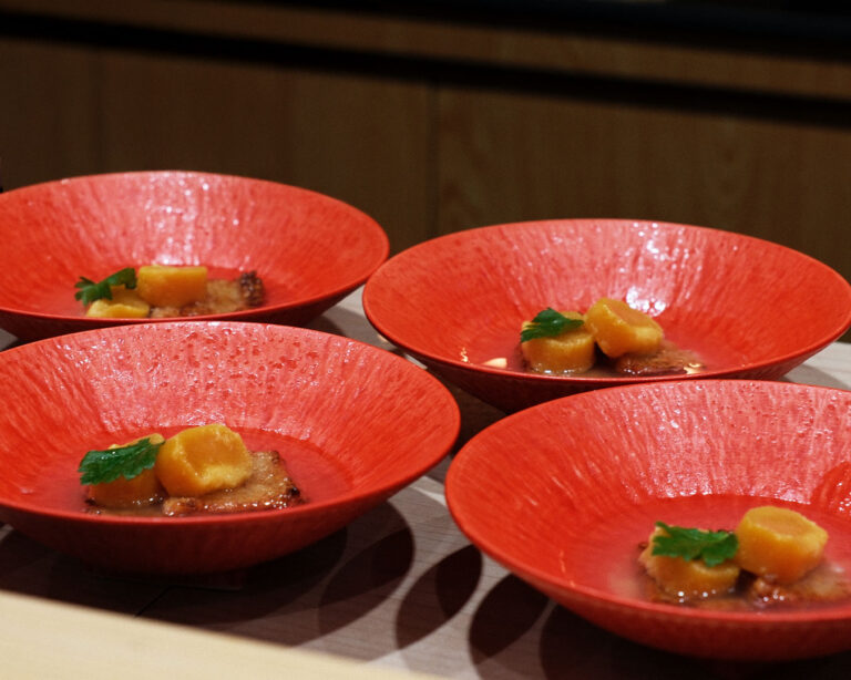 An elegant dish prepared by Chef Masa, featuring carefully selected ingredients arranged in a minimalist style that emphasises freshness and natural beauty.