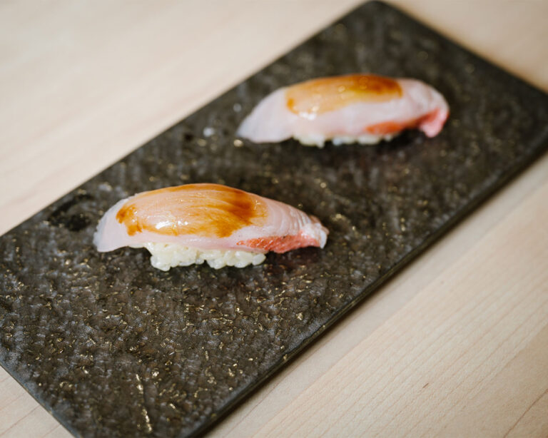 An assortment of omakase sushi presented on the table, highlighting craftsmanship and seasonal ingredients.