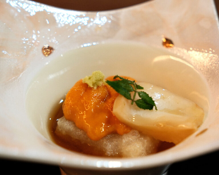 A plated Murasaki uni dish served at Sushi Masa, elegantly arranged with minimal garnish to highlight the uni’s vibrant colour, premium quality, and fine dining presentation.
