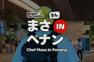 Chef Masa walking around iChangi Airport with the logo and title banner “Behind the Counter: Chef Masa in Penang” in the front.